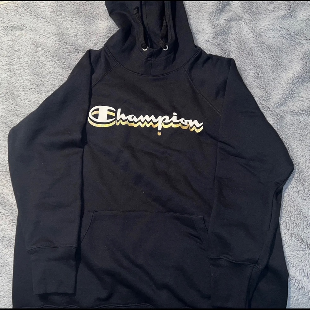 XL/1x Women’s black Champion hoodie with white and gold writing